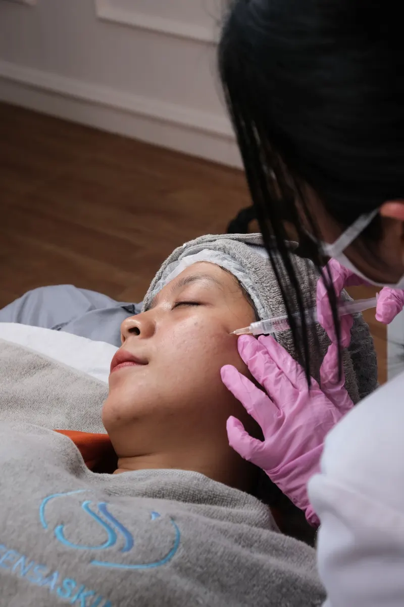 Illustrative photo: a skin procedure in a clinic